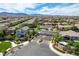 Aerial view of the neighborhood featuring well-maintained homes, lush greenery, and well-planned community layouts at 9921 Rams Leap Ave, Las Vegas, NV 89166