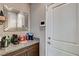 Functional coffee bar with granite counters and decorative mirror offers a stylish beverage station at 9921 Rams Leap Ave, Las Vegas, NV 89166