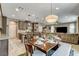 Open-concept kitchen and dining area, seamlessly connected to the living room at 9921 Rams Leap Ave, Las Vegas, NV 89166