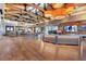Open lobby with wood floors, fireplace, ample seating, and reception area at 9921 Rams Leap Ave, Las Vegas, NV 89166