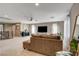 Spacious loft area with comfortable seating, lots of natural light, and a neutral color palette at 9921 Rams Leap Ave, Las Vegas, NV 89166