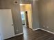 This bedroom has wood flooring and a doorway leading to the en-suite bathroom at , Las Vegas, NV 89148