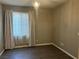 This bedroom has wood flooring, a chandelier and a window with light filtering shades at , Las Vegas, NV 89148
