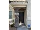 Exterior shot of the front door and porch with ADT security sign visible at , Las Vegas, NV 89148