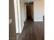 Hallway featuring hard surface flooring and neutral paint at , Las Vegas, NV 89148