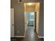 Hallway with view of bathroom, showing flooring and neutral paint at , Las Vegas, NV 89148