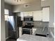 This kitchen has stainless steel appliances, modern countertop and stainless steel sink at , Las Vegas, NV 89148