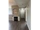 Living room featuring a fireplace, built-in shelving, and hard surface flooring at , Las Vegas, NV 89148