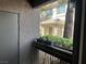 Balcony view showcases the exterior of a building with greenery and outdoor decor at , Las Vegas, NV 89148