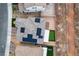 Aerial view of home with solar panels, putting green, and covered patio at 10372 Thurso Ave, Las Vegas, NV 89166