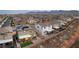 An aerial shot of a new home with solar panels in a well-planned community with mountain views at 10372 Thurso Ave, Las Vegas, NV 89166