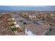 An aerial view of a residential area showcasing many two-story homes and solar panels at 10372 Thurso Ave, Las Vegas, NV 89166