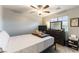 Cozy bedroom showcasing a comfortable bed, dresser, and a plush teddy bear at 10372 Thurso Ave, Las Vegas, NV 89166