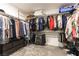 Well-organized walk-in closet with ample storage for clothing and accessories at 10372 Thurso Ave, Las Vegas, NV 89166