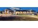 Beautiful Skye Canyon clubhouse exterior with parking lot at 10372 Thurso Ave, Las Vegas, NV 89166
