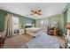 Inviting bedroom features plush carpet, ceiling fan and stylish furnishings at 10440 Bay Ginger Ln, Las Vegas, NV 89135