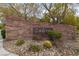 Stone community sign with lush landscaping and decorative rock at 10440 Bay Ginger Ln, Las Vegas, NV 89135