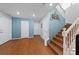 Entryway featuring hardwood floors and an open staircase at 10440 Bay Ginger Ln, Las Vegas, NV 89135