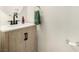 Half bathroom featuring a modern vanity with matte black hardware at 105 Pollentia Ave, North Las Vegas, NV 89084