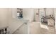 Bright loft area with a desk, printer, and natural light from the window at 105 Pollentia Ave, North Las Vegas, NV 89084