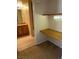 Compact office nook with a built-in desk; vanity and sink are visible through the doorway at 10550 W Alexander Rd # 2183, Las Vegas, NV 89129