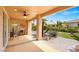 Outdoor patio provides ample seating and shade with an outdoor ceiling fan at 10581 Santo Marco Ct, Las Vegas, NV 89135