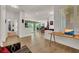Spacious living room with wood floors, neutral decor, with a view of the outdoor patio at 10581 Santo Marco Ct, Las Vegas, NV 89135