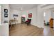 Well-lit home office featuring wood floors, modern furnishings, and a neutral color palette at 10581 Santo Marco Ct, Las Vegas, NV 89135