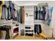 Organized walk-in closet with custom shelving providing ample storage space for clothes and accessories at 10581 Santo Marco Ct, Las Vegas, NV 89135