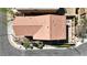 Aerial shot featuring an inviting backyard with a well-manicured lawn and a cozy patio set at 10624 Tuckermans Ave, Las Vegas, NV 89129