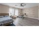 Bedroom with a queen bed and desk at 10624 Tuckermans Ave, Las Vegas, NV 89129