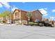 Inviting two-story home with a two-car garage, desert landscaping, and a charming, warm-toned exterior at 10624 Tuckermans Ave, Las Vegas, NV 89129