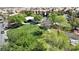 Lush community park with play areas, trees, and walking paths nestled within the neighborhood at 10624 Tuckermans Ave, Las Vegas, NV 89129