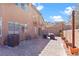 Charming backyard with a paved patio, comfortable seating, and string lights, perfect for outdoor entertaining at 10624 Tuckermans Ave, Las Vegas, NV 89129