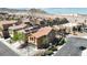 Charming neighborhood view featuring well-maintained homes, sidewalks, and desert landscaping against a mountain backdrop at 10624 Tuckermans Ave, Las Vegas, NV 89129