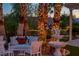 Outdoor seating area with decorative lighting and features, perfect for relaxation at 11037 Clarion Ln, Las Vegas, NV 89134
