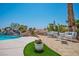 Landscaped backyard features waterfalls, seating and mature trees at 11037 Clarion Ln, Las Vegas, NV 89134