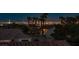 Stunning Las Vegas city skyline view from rooftop featuring The Strip, palm trees, and nearby homes at 11037 Clarion Ln, Las Vegas, NV 89134