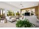 Inviting living room with stylish decor, plush seating, and large windows, creating a comfortable and relaxing space at 11037 Clarion Ln, Las Vegas, NV 89134