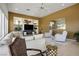 Bright living room with plush seating, fireplace, and modern decor at 11037 Clarion Ln, Las Vegas, NV 89134