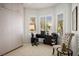 Bright office space with tile floors, built-in storage, and a desk by the windows at 11037 Clarion Ln, Las Vegas, NV 89134