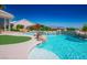 Resort style pool area featuring a putting green, rock features, and lush landscaping at 11037 Clarion Ln, Las Vegas, NV 89134