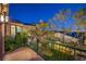 Overlooking the serene green landscape and trees from the terrace, creating a peaceful outdoor space at 11573 Glowing Sunset Ln, Las Vegas, NV 89135