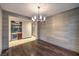 Stylish dining room with modern lighting and hardwood flooring at 11573 Glowing Sunset Ln, Las Vegas, NV 89135