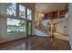 Spacious living room with large windows, hardwood floors, and elegant finishes at 11573 Glowing Sunset Ln, Las Vegas, NV 89135