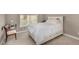 Comfortable bedroom features a large window, neutral walls, carpet, and a bed with storage drawers at 11870 Tevare Ln # 1085, Las Vegas, NV 89138