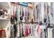 Walk-in closet featuring lots of hanging clothing, shelving, and storage space at 11870 Tevare Ln # 1085, Las Vegas, NV 89138