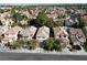 Beautiful suburban home with a tile roof, mature trees, and well-maintained landscaping at 1348 Calle Montery St, Las Vegas, NV 89117