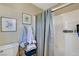 Bathroom featuring a shower/tub with tiled walls and coordinated decor at 1348 Calle Montery St, Las Vegas, NV 89117