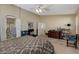 Comfortable bedroom featuring neutral walls and an ensuite bathroom at 1348 Calle Montery St, Las Vegas, NV 89117